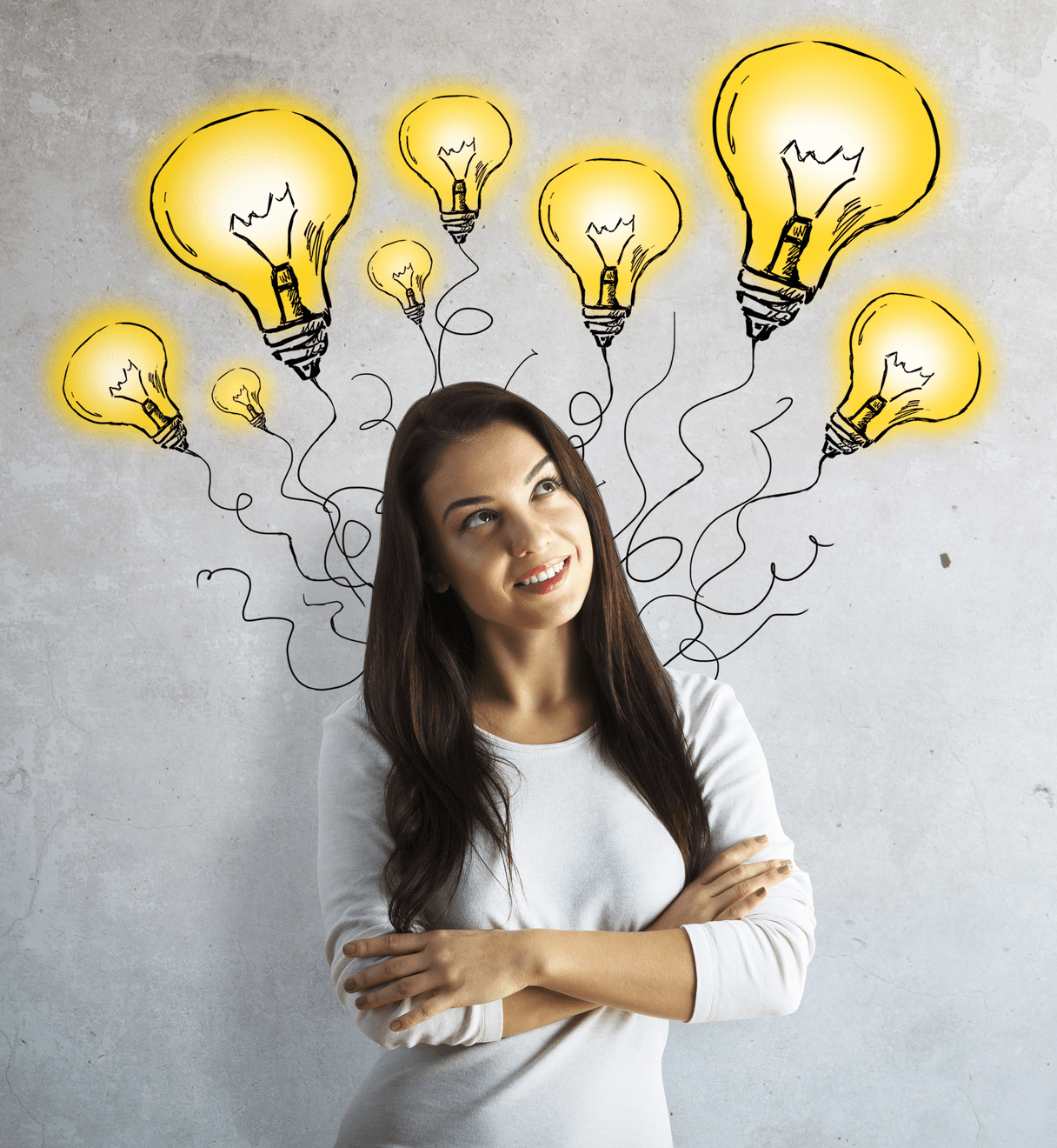 A woman in a white shirt stands against a gray background, smiling with arms crossed. Cartoon yellow light bulbs surround her head, suggesting ideas.